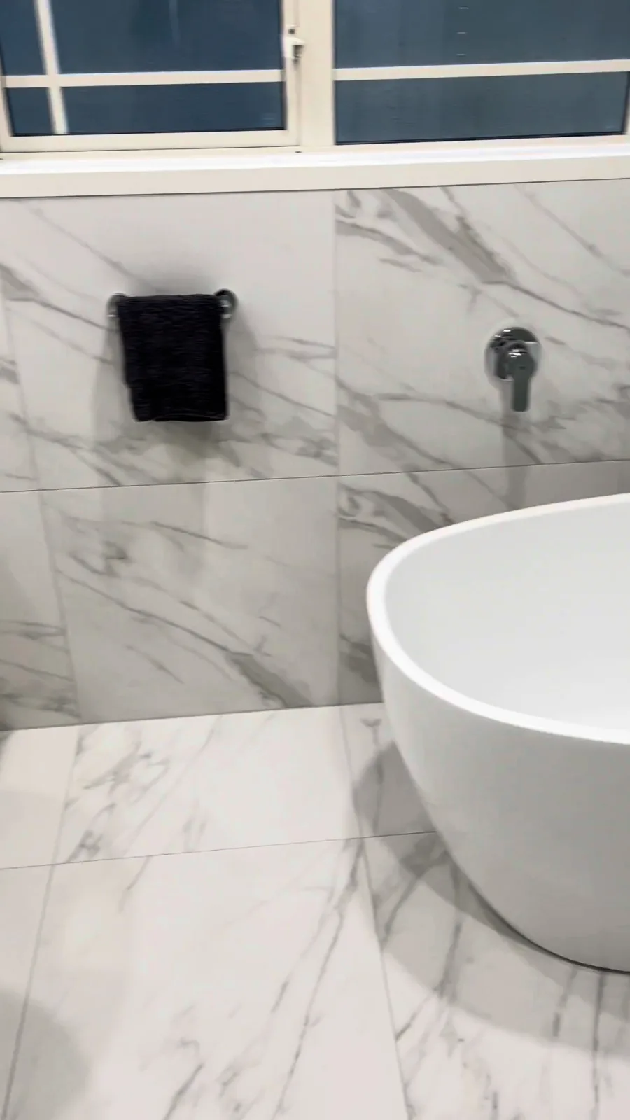 Freestanding oval bath with a chrome wall mixer under the window, Kohimarama bathroom renovation