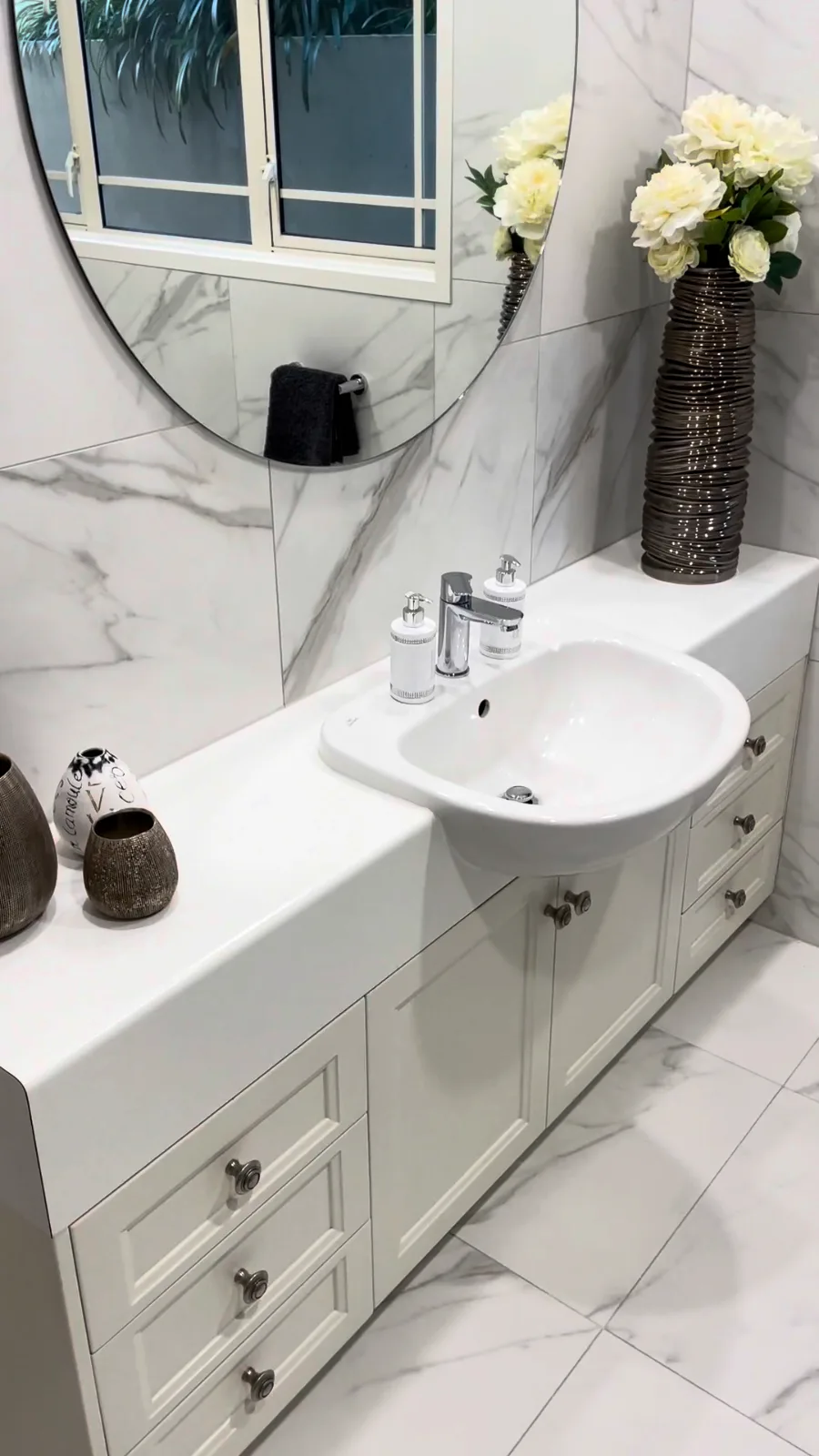 Original white shaker-style vanity with a semi-recessed basin kept in a Kohimarama renovation