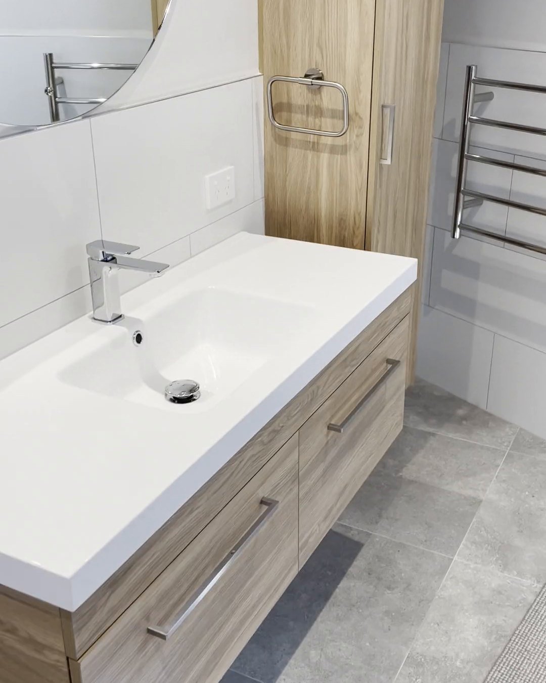 Square chrome mixer on a white basin top with the basin moulded in, Parnell bathroom renovation