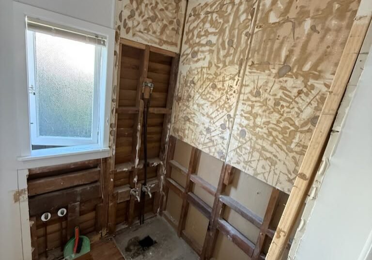 Bathroom stripped back to the wall framing during an Alchemy renovation Bathroom stripped back to the wall framing during an Alchemy renovation