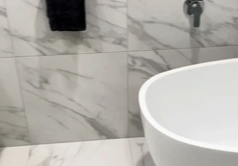 Freestanding bath and wall mixer, Kohimarama bathroom renovation Freestanding oval bath with a chrome wall mixer under the window, Kohimarama bathroom renovation